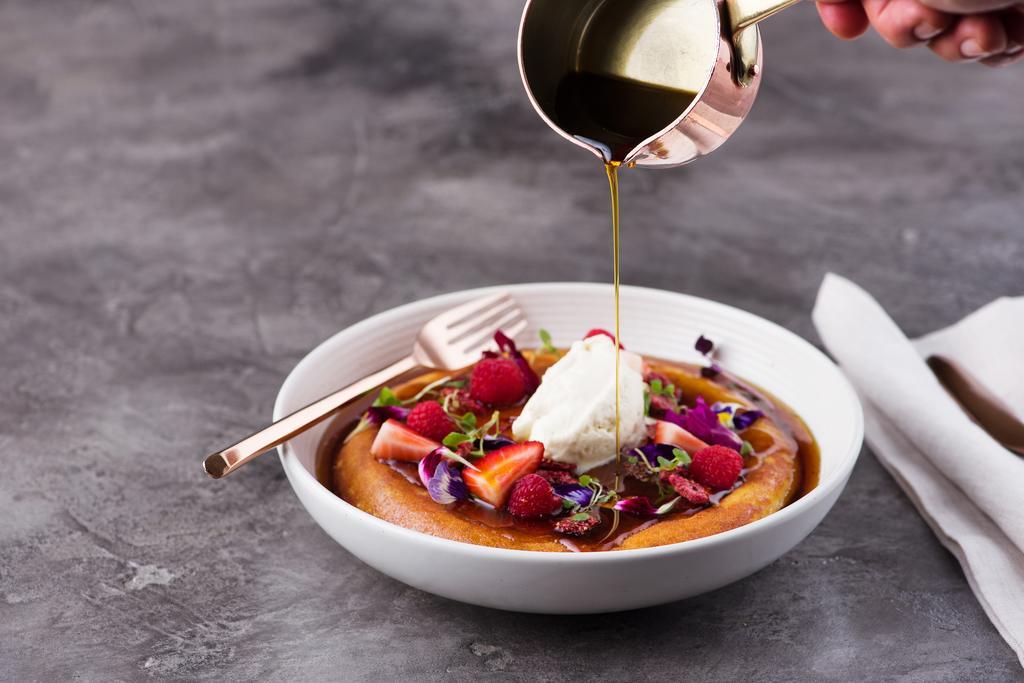 Treasury Brisbane Exterior foto A bowl of dessert with edible flowers